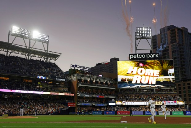 Manny Machado #13 of the San Diego Padres rounds the bases after hitting solo home run in the fifth inning against the Arizona Diamondbacks at Petco Park on July 10, 2025 in San Diego, California. (Photo by K.C. Alfred / The San Diego Union-Tribune)