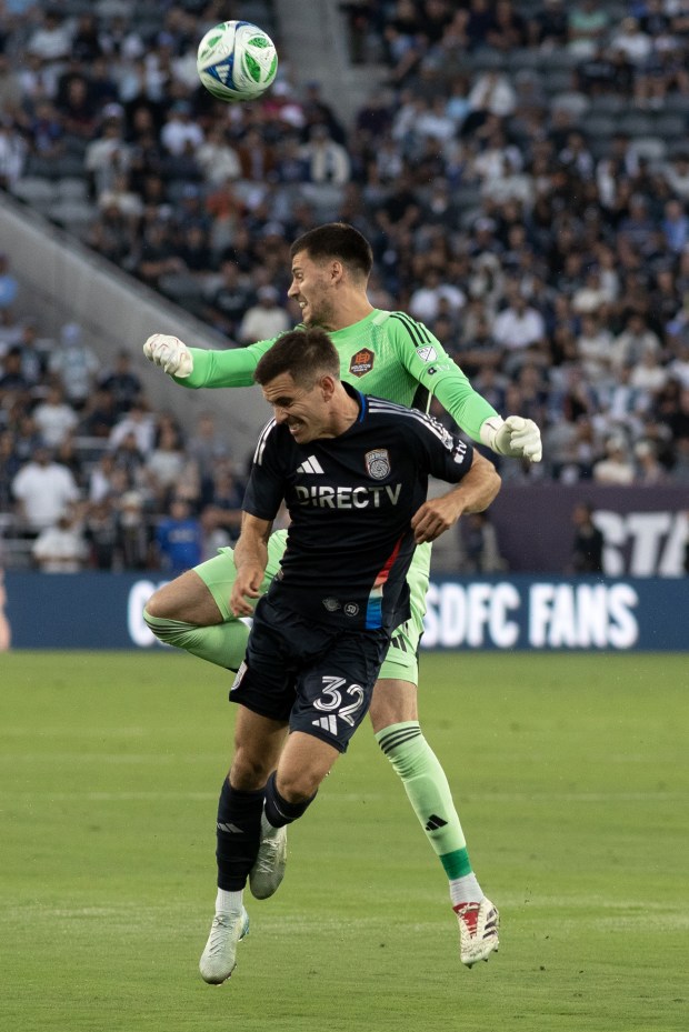 SDFC's Milan Iloski (32) fights for position during Saturday's MLS match against the Houston Dynamo, at Snapdragon Stadium in San Diego, CA. (Xavier Hernandez for the UT)