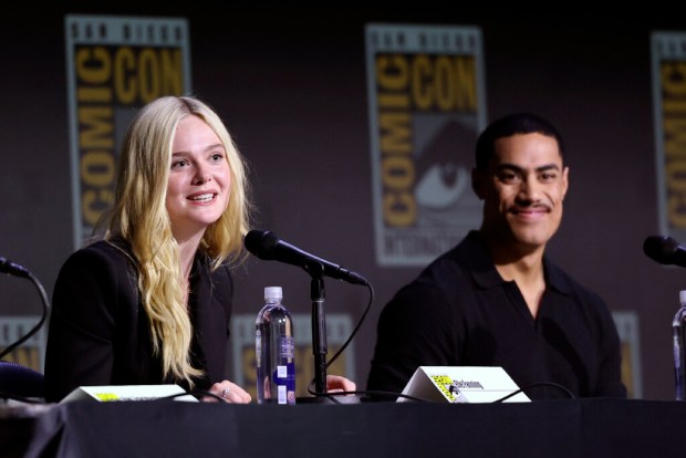 Elle Fanning and Dimitrius Schuster-Koloamatangi speak onstage at 20th Century Fox's "Predator: Badlands" Panel" during 2025 Comic-Con International: San Diego at San Diego Convention Center on July 25, 2025 in San Diego, California. (Photo by Amy Sussman/Getty Images)