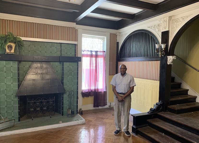 Cornerstone Baptist Church's Chris Simmons in the front room of the former Linz House, which...