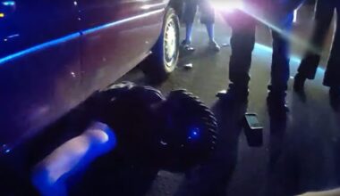 Motorcyclist trapped under car saved...