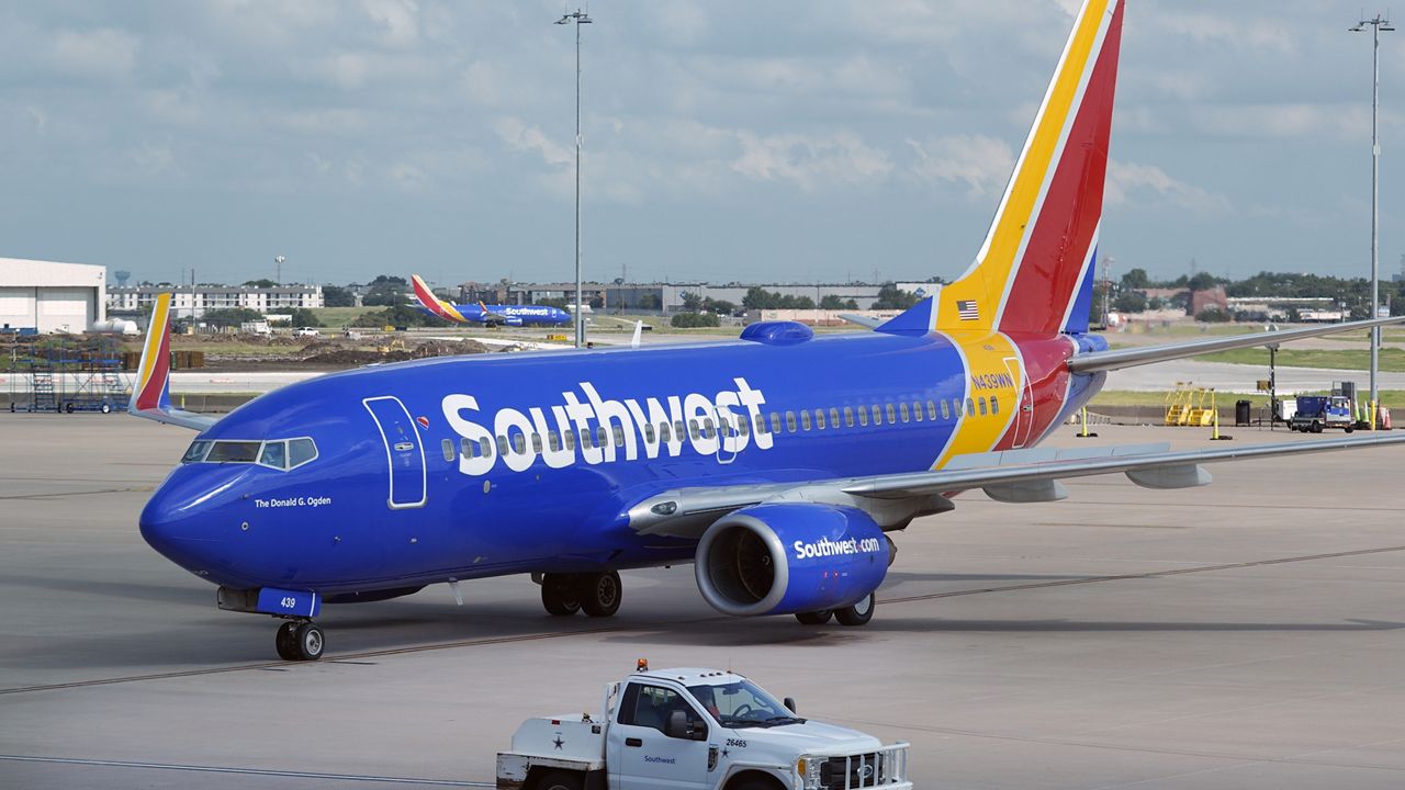 A Southwest Airlines plane moves to depart from Love Field in Dallas, July 25, 2024. (AP Photo/LM Otero, File)