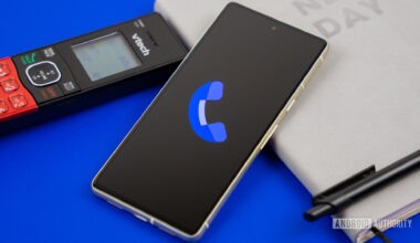 Stock photo of Phone by Google app on phone next to home phone agenda and pen 5