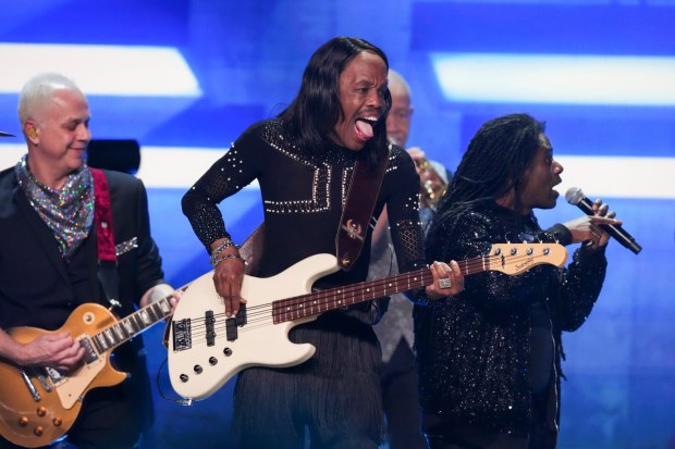 Serg Dimitrijevic, from left, Verdine White, and Philip Bailey, Jr. of Earth, Wind & Fire perform during the FireAid benefit concert on Thursday, Jan. 30, 2025, at Intuit Dome in Inglewood, Calif. The band will headline the Hollywood Bowl's July Fourth Fireworks Spectacular July 2-4, 2025. (Photo by Jordan Strauss/Invision/AP)