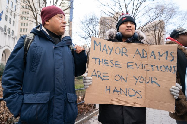 Activists gather at a rally in Manhattan in February urging Mayor Eric Adams to implement legislation passed by the city council to reform CityFHEPS, a housing voucher program. 
