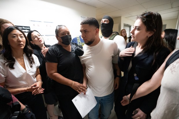 Federal law enforcement officers take immigrants into custody in Jacob K. Javits Building Thursday, July 3, 2025 in Manhattan, New York. (Barry Williams/ New York Daily News)
