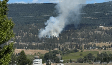 Police conducting evacuations as wildfire burns near Kelowna airport