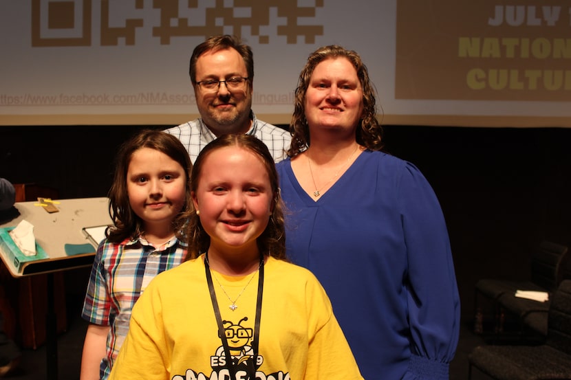 Melody Hinkle posing for a photo with her family after winning the National Spanish Spelling...