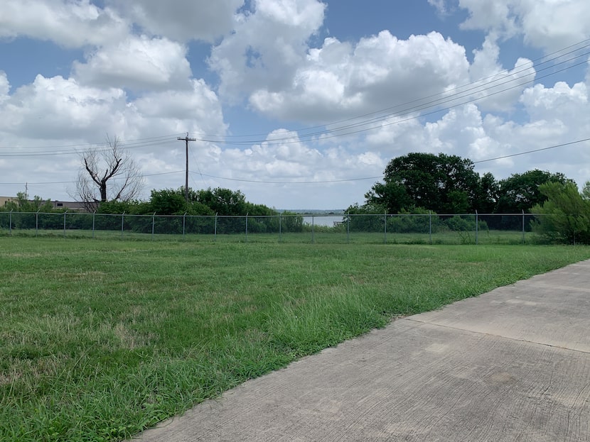 A glimpse of Mountain Creek Lake from the back of Hensley Field, near the area where Dallas...