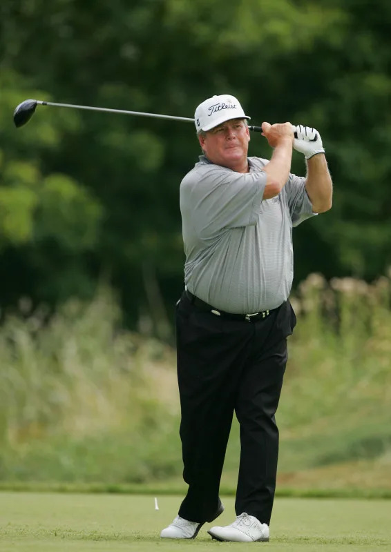 DEARBORN, MI - JULY 10: Ed Fiori hits a shot during the third round of the Ford Senior Players Championship at the TPC of Michigan on July 10, 2004 in Dearborn, Michigan. (Photo by Scott Halleran/Getty Images)<p><a href="https://www.gettyimages.com/detail/51073186" rel="nofollow noopener" target="_blank" data-ylk="slk:Scott Halleran&sol;Getty Images;elm:context_link;itc:0;sec:content-canvas" class="link ">Scott Halleran&sol;Getty Images</a></p>