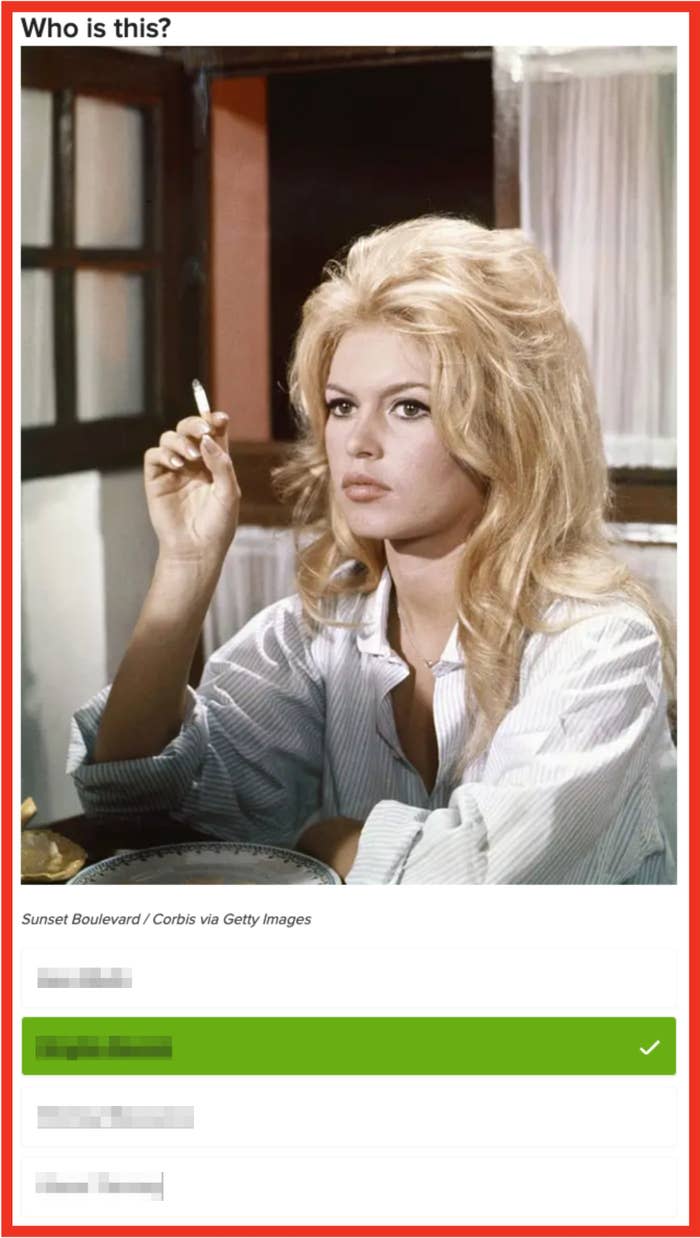 A woman with voluminous blonde hair is seated indoors, holding a cigarette, wearing a striped blouse. The caption options suggest it's Brigitte Bardot