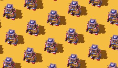 Pattern of retro tin toy robots with clocks and displays painted on yellow background.