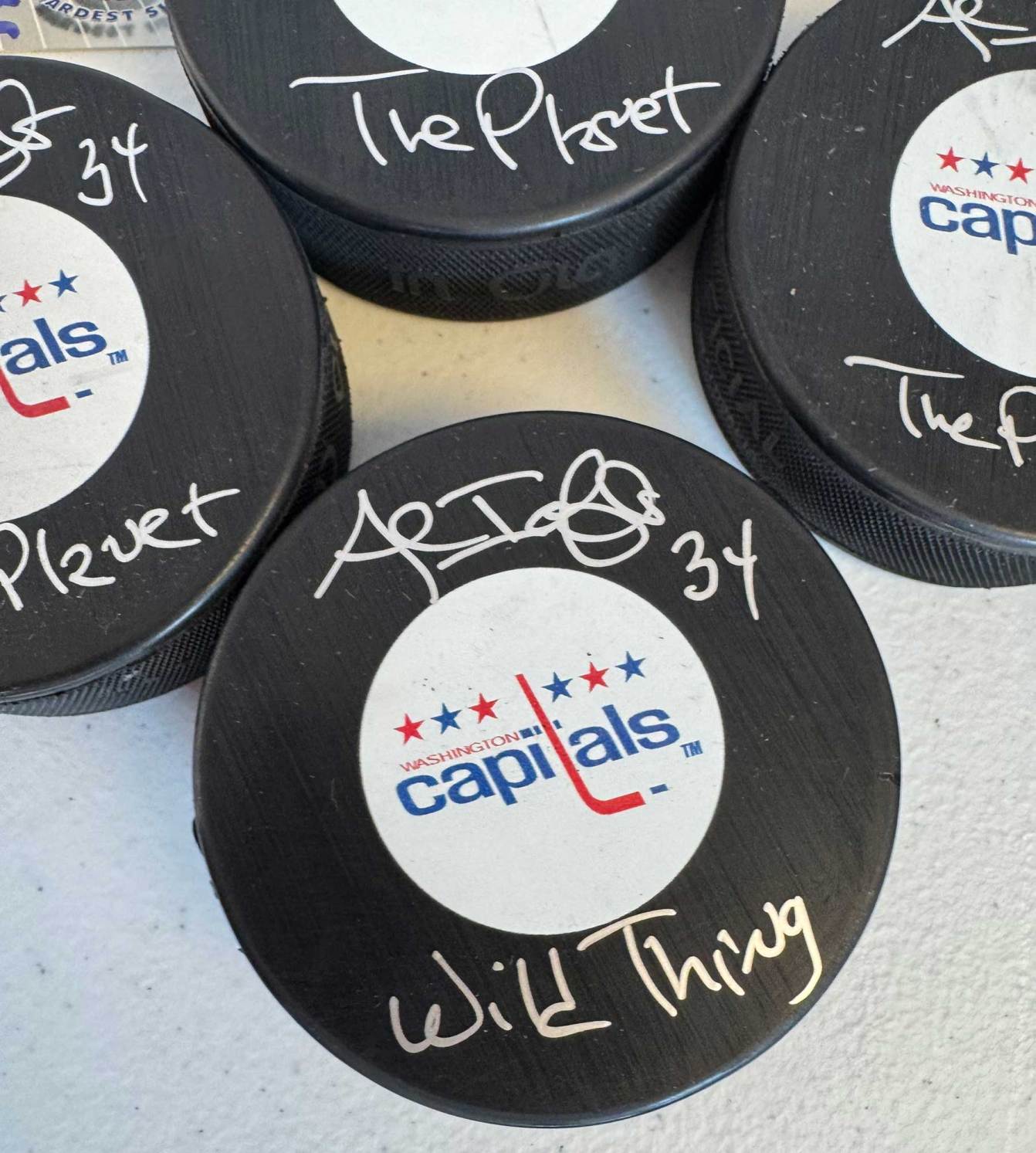 Al Iafrate autographed pucks