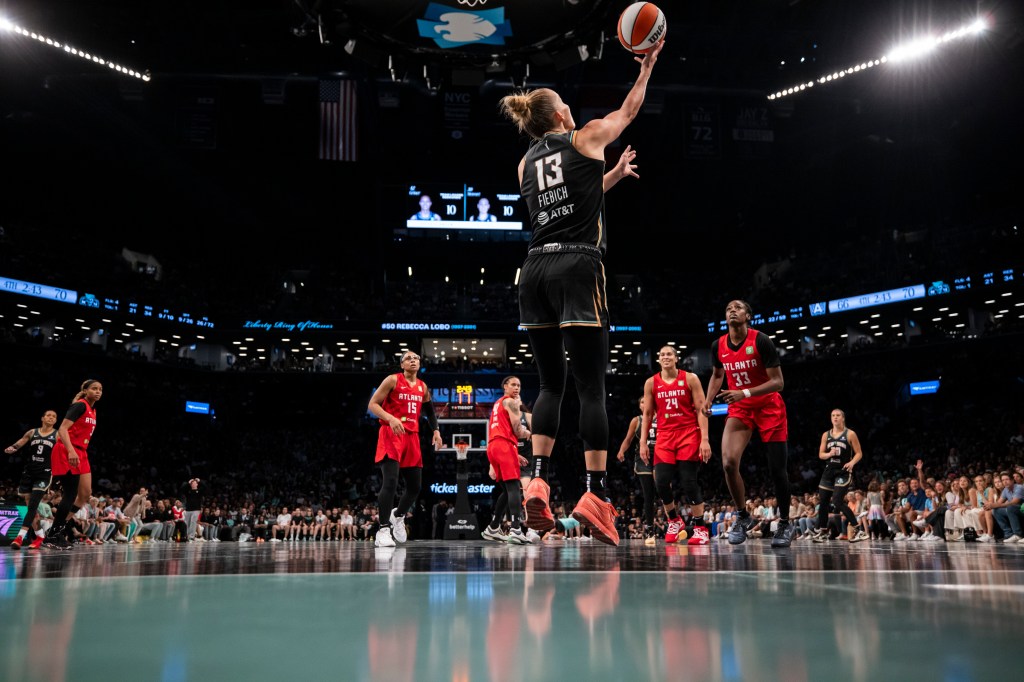 Leonie Fiebich makes a layup during the Liberty-Dream game on July 13, 2025.