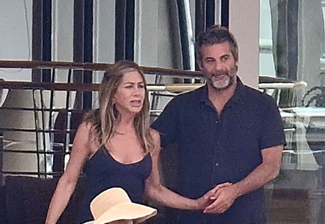 Joan Llado / GTres / SplashNews Jennifer Aniston and Jim Curtis