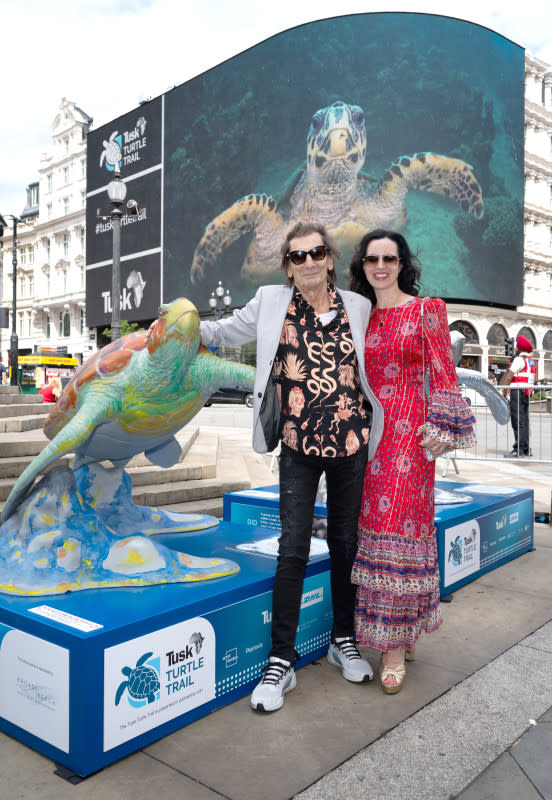 LONDON, ENGLAND - JULY 16: Ronnie Wood and Sally Wood pose with their turtle as they attend the launch of the Tusk Turtle Trail 2025 on July 16, 2025 in London, England. (Photo by Eamonn M. McCormack/Getty Images)Eamonn M&period; McCormack&sol;Getty Images