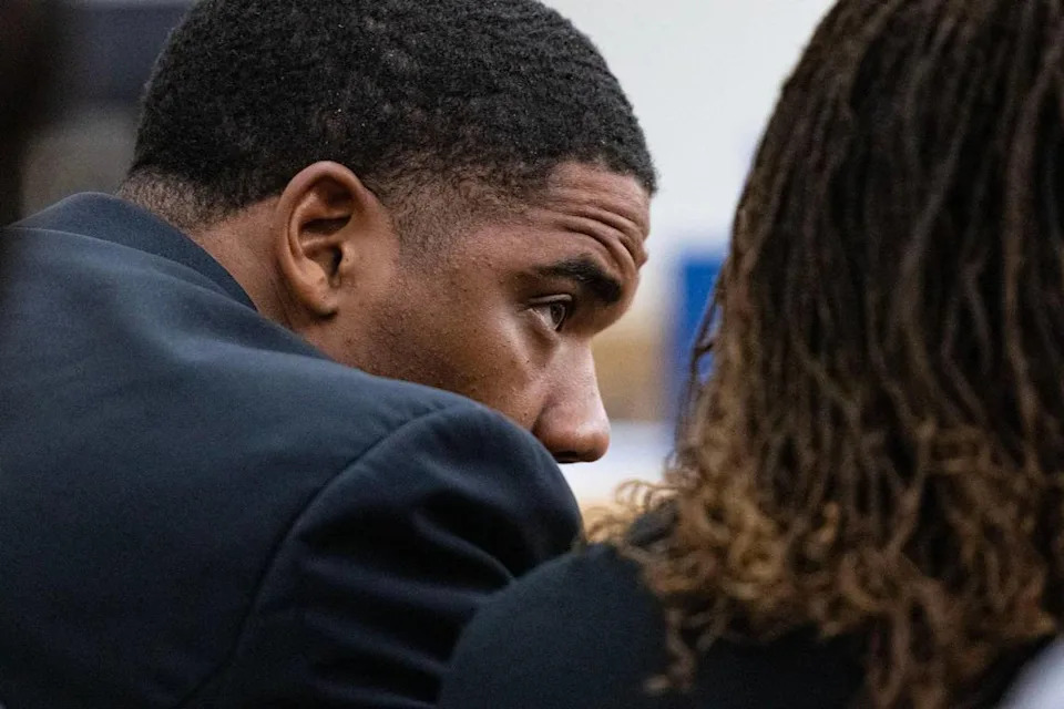 Defendant Jacoby Roberts sits with his family at his capital murder trial in the 369th District Court at the Tim Curry Criminal Justice Center in Fort Worth on Thursday, July 24. Roberts shot to death his cousin Jailon Freeman.