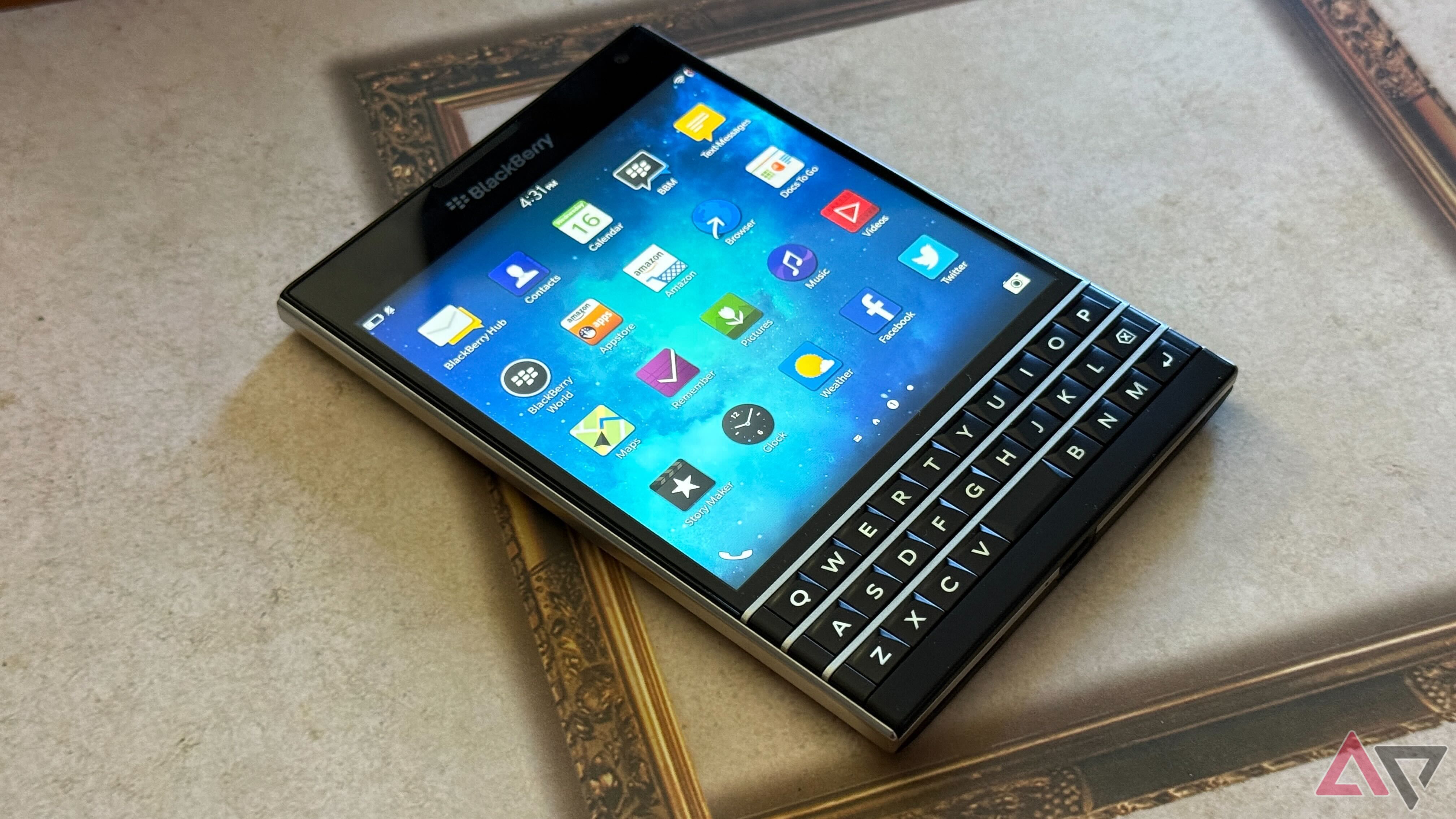 blackberry passport sitting on table with screen on