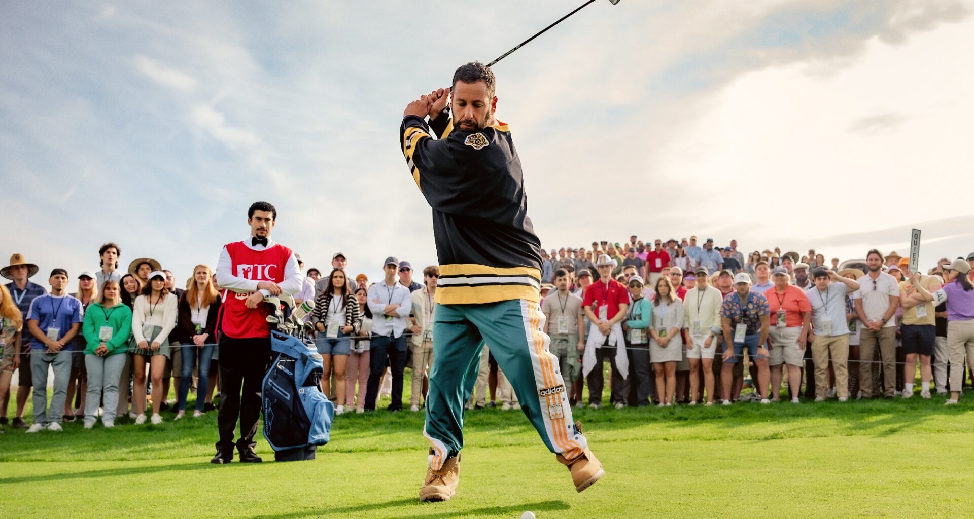 Happy Gilmore 2. (L to R) Benito Antonio Martínez Ocasio as Busboy and Adam Sandler as Happy Gilmore in Happy Gilmore 2.