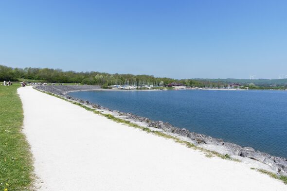 Carsington Reservoir and boatyards on a bright spring day.