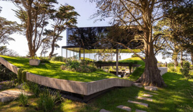 casa moro's green concrete mantle follows natural slope in buenos aires