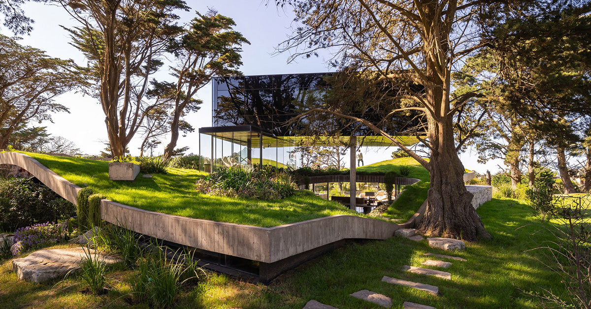 casa moro's green concrete mantle follows natural slope in buenos aires