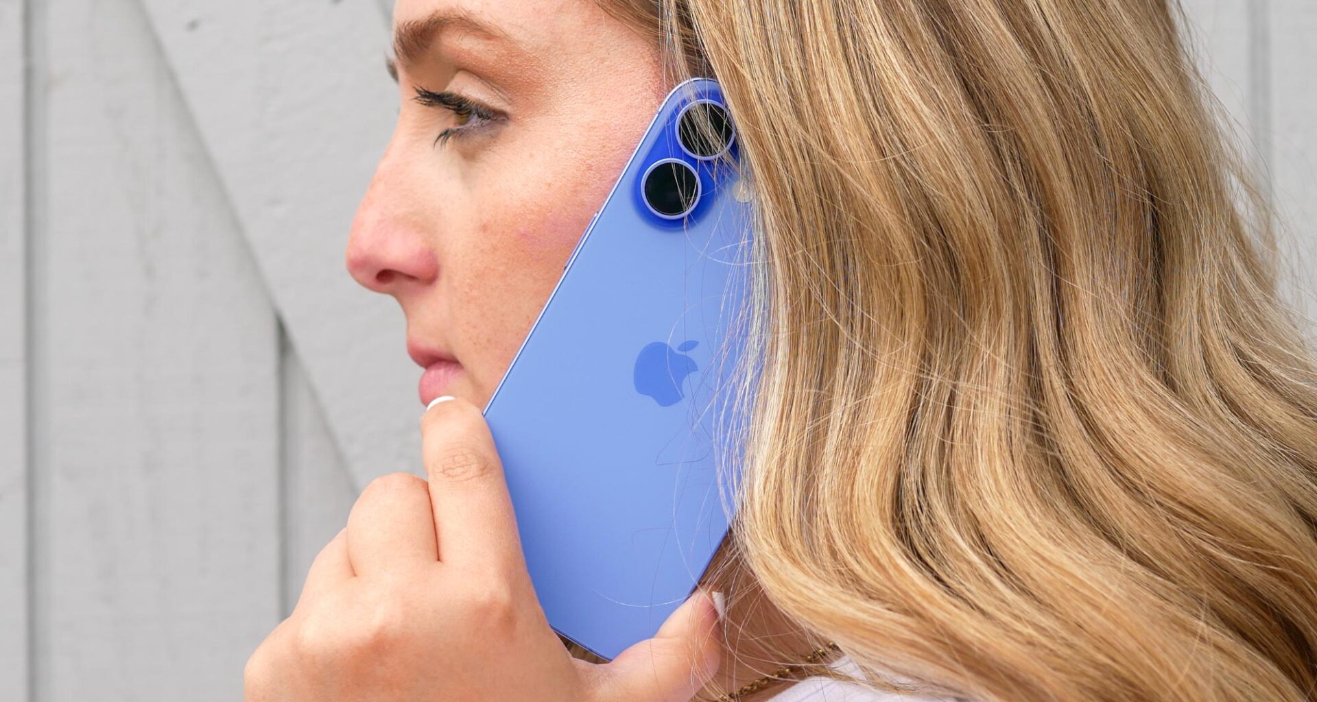 Apple iPhone 16 held in the hand.