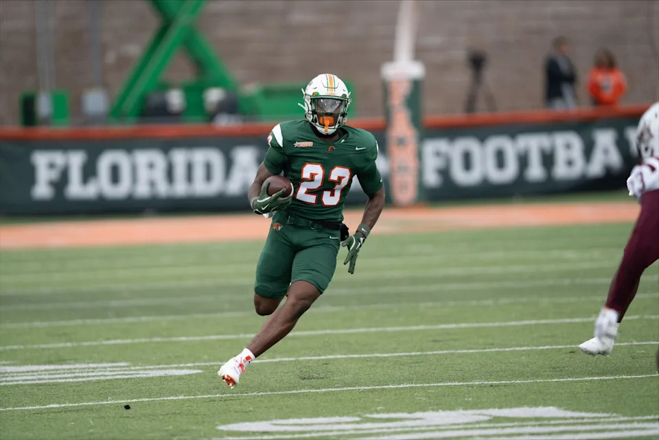 Florida A&M running back Thad Franklin Jr. runs the football versus the Alabama A&M Bulldogs in a Southwestern Athletic Conference game on Ken Riley Field at Bragg Memorial Stadium, Friday, Nov. 29, 2024.
