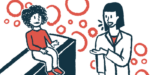 A clinician speaks to a child who sits on an examination table.