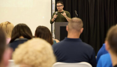 Andrew Koenig delivering opening remarks at CITY Furniture's Green Summit in Tamarac, FL