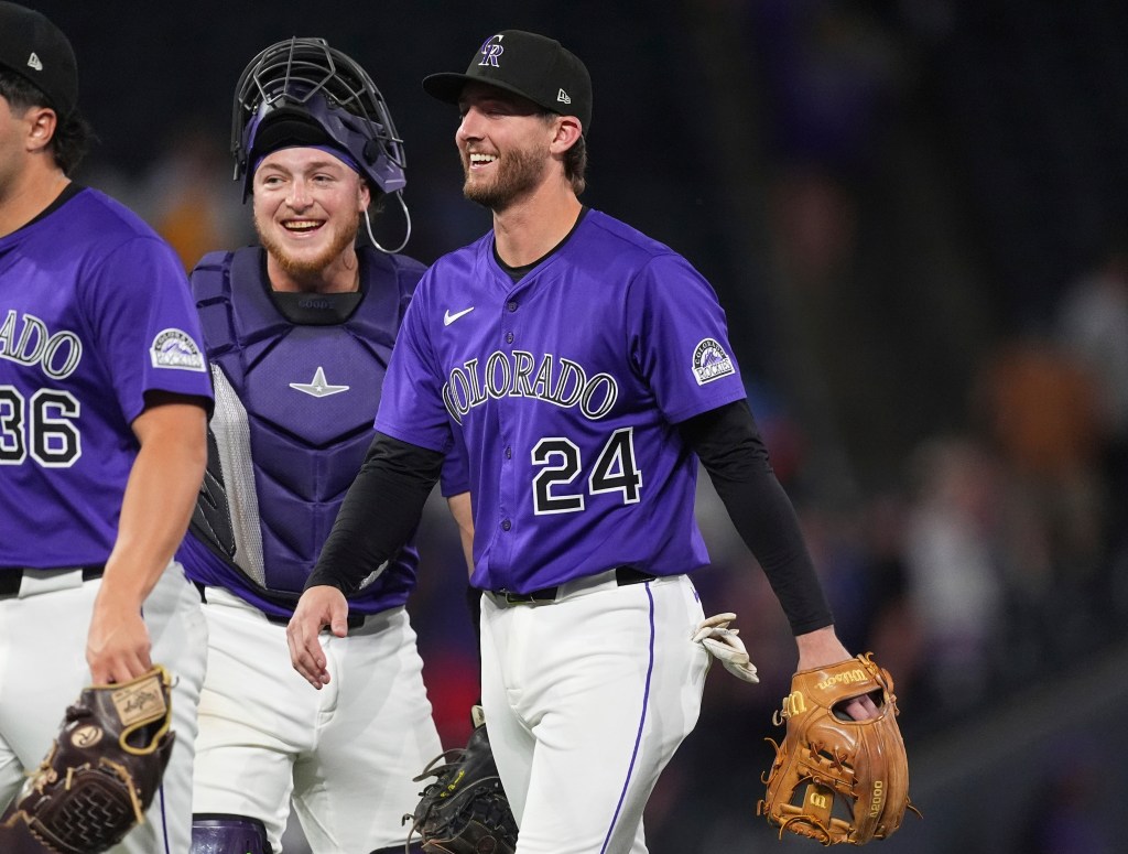 Colorado Rockies players celebrating a win.