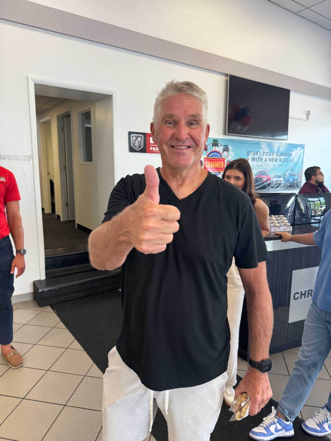 Craig Laughlin gives a thumbs up