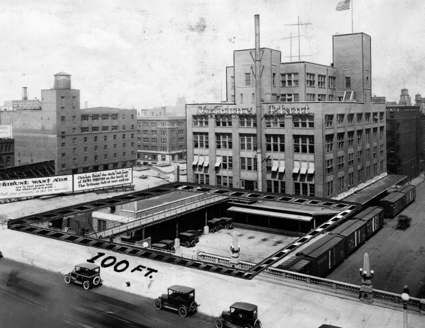 The vacant site immediately in front of the Tribune plant at Michigan Avenue is where the new Tribune Tower building is to be erected in 1924. The vacant area comprises 13,500 square feet. To the south and west it overlooks the river and the commercial heart of Chicago; to the north and east it faces the parks and drives and Lake Michigan. (Chicago Tribune historical photo) 
