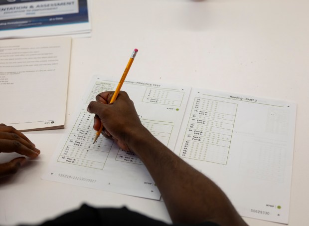 A student takes the preassessment exam for a GED course on July 7, 2025, at the nonprofit A Safe Haven Foundation in North Lawndale. (Brian Cassella/Chicago Tribune)