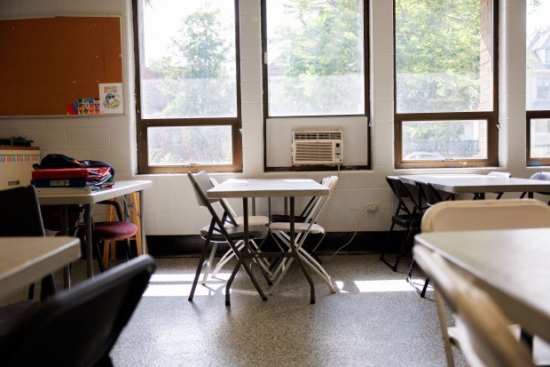 An air conditioning unit works in a window of a...
