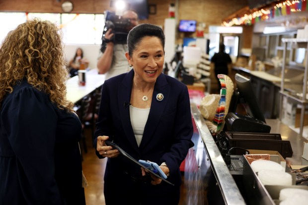 Illinois Comptroller Susana Mendoza greets people attending a news conference in Little Village, July 16, 2025, after announcing that she would not run for a fourth term in 2026 as the state's top fiscal officer. Her announcement opens the door for her to challenge Brandon Johnson in what would be her second bid for Chicago mayor. (Brian Cassella/Chicago Tribune)