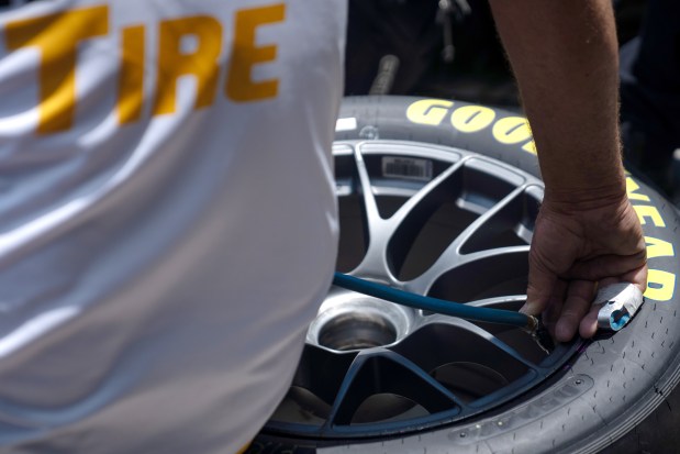 A crew member releases tire air for Katherine Legge (78)'s team during the NASCAR Xfinity Series The Loop 110 on July 5, 2025. (Audrey Richardson/Chicago Tribune)