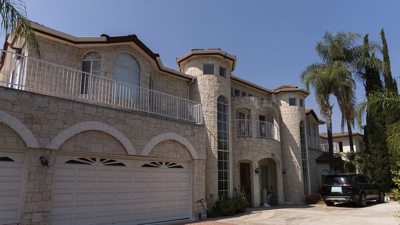 The home of Silvia Zhang and Guojun Xuan is seen on Wednesday, July 16, 2025, in Arcadia, Calif., where a number of children were removed from the couple's home after a child abuse allegation in May, according to Arcadia police. (AP Photo/Jae C. Hong)