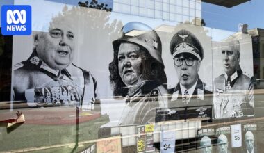 Wagga Wagga man charged with displaying Nazi symbols over shopfront poster