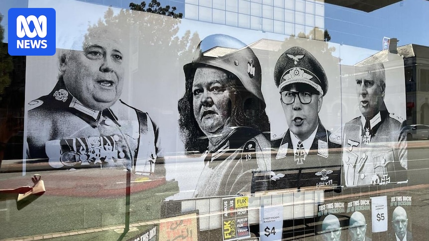 Wagga Wagga man charged with displaying Nazi symbols over shopfront poster