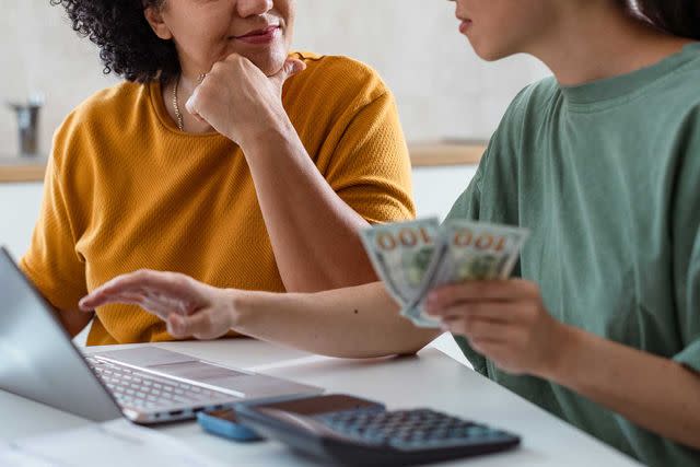 Getty Stock Images Stock photo of two women working through financial documents