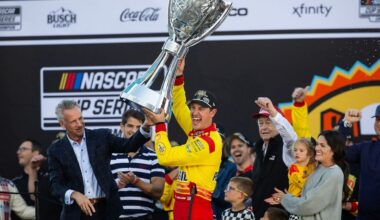 Joey Logano gives out autographs at The Great American Getaway 400 at Pocono Raceway on June 21, 2025.