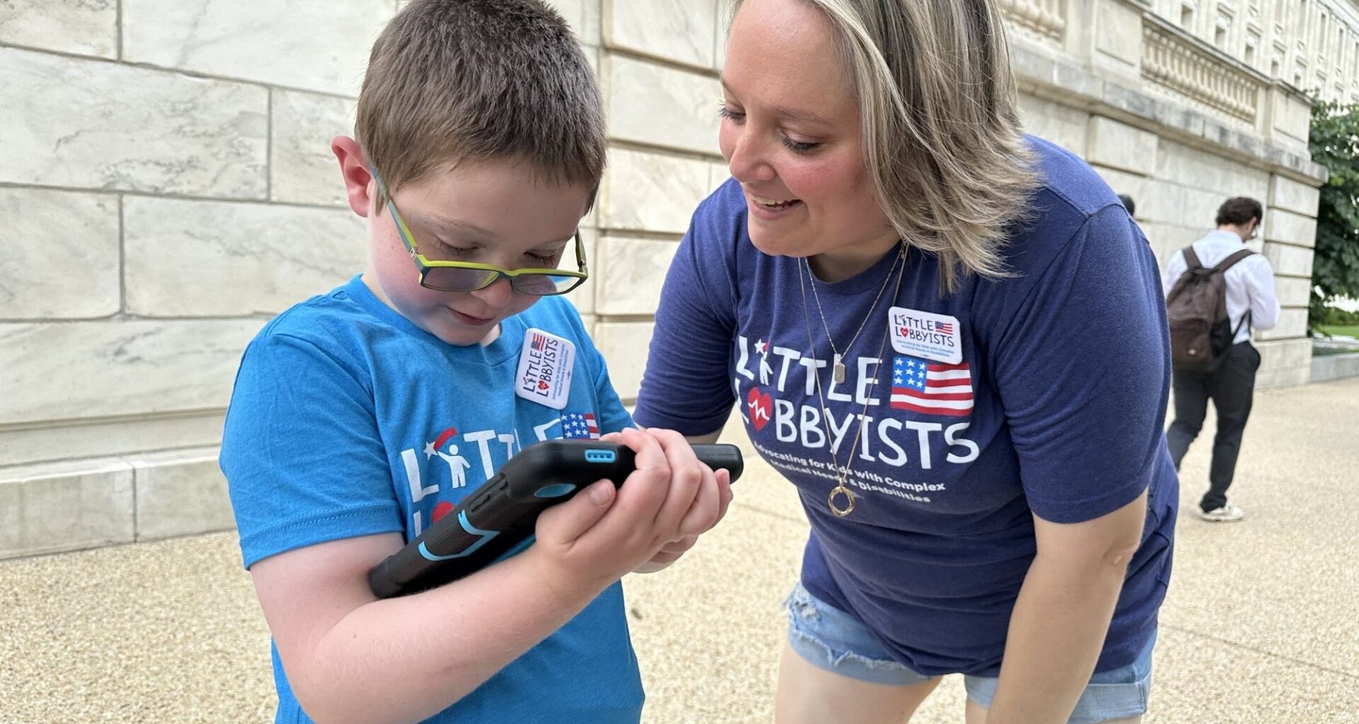 Victoria Schiano and her son, Cole, urged lawmakers to vote against the latest GOP tax bill. They are part of Little Lobbyists, an advocacy group for families of children with complex medical needs.