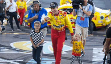 NASCAR Cup Series champion Joey Logano, left, is greeted by Mario Andretti, right, during the NASCAR Awards Show at Music City Center in Nashville, Tenn., Thursday, Dec. 1, 2022.