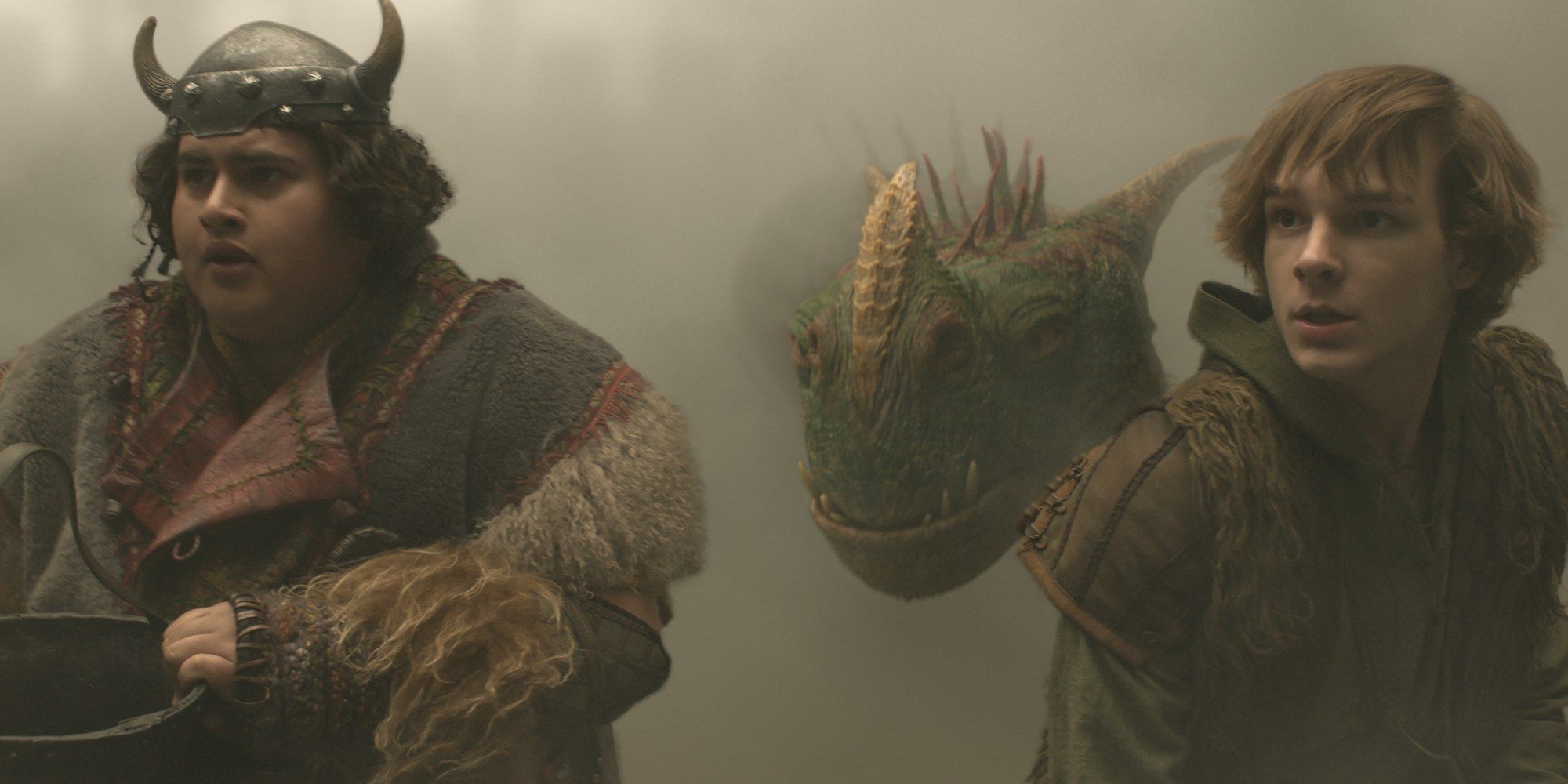 fishlegs and hiccup with a dragon behind them in how to train your dragon