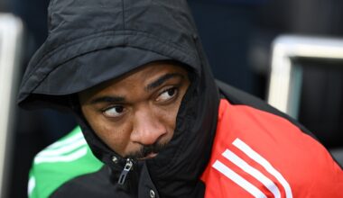 LONDON, ENGLAND: Raheem Sterling of Arsenal looks on, while sitting on the substitutes bench during the Premier League match between Fulham FC and ...