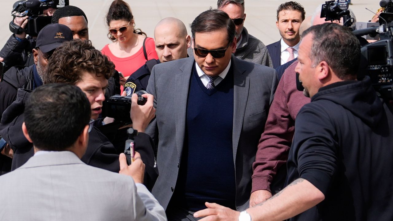 Former U.S. Rep. George Santos arrives at federal court for sentencing, Friday, April 25, 2025, in Central Islip, N.Y. (AP Photo/Julia Demaree Nikhinson)