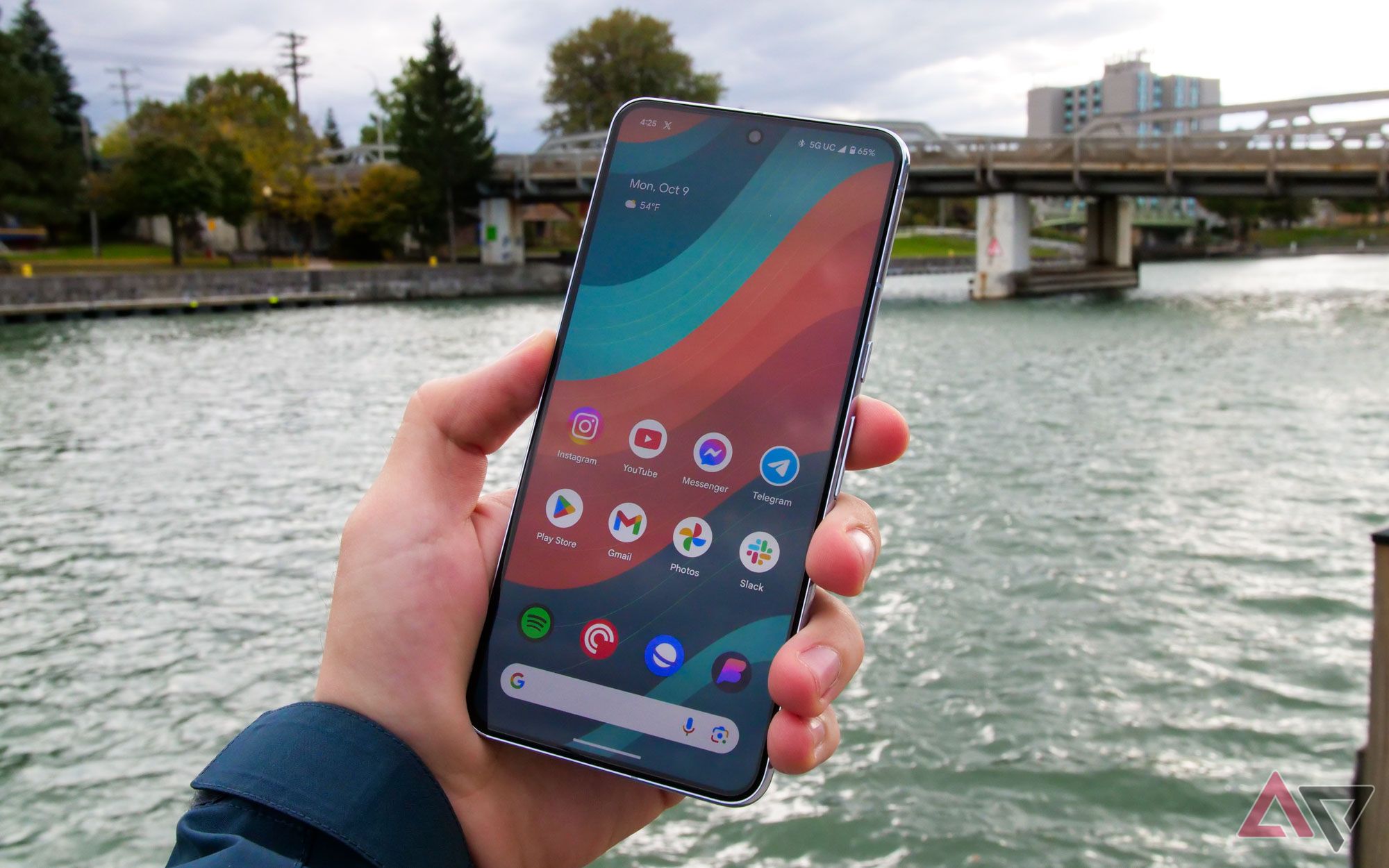 The Pixel 8 Pro's home screen against a water backdrop.