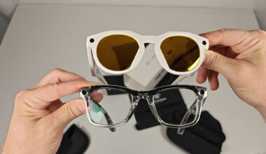 Comparing the front of the warm white Oakley Meta HSTN with transparent Ray-Ban Meta Smart Glasses