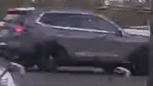 A photo released by CrimeStoppers shows a Honda CR-V wanted in a felony hit-and-run of a bicyclist, police say.